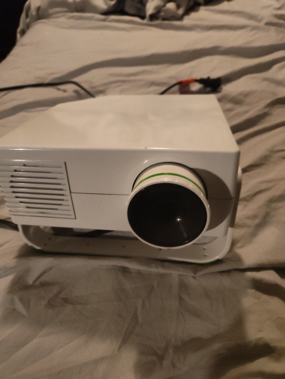 Compact White Projector with Green Accent